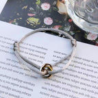 Grey three-ring bracelet