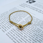 Mustard yellow tricyclic bracelet