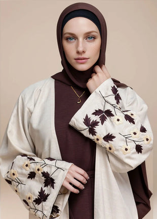 Apricot Color Muslim Abaya Boasting Exquisite Floral Cuff Embroidery Blending Timeless Elegance and Fashion for Ramadan Islamic