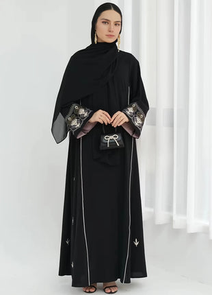 Middle East Style Muslim Kaftan Black Fabric Embroidered Sleeve Design White Line Accents for Gulf Region Modest Fashion Events