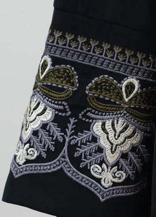Middle East Style Muslim Kaftan Black Fabric Embroidered Sleeve Design White Line Accents for Gulf Region Modest Fashion Events